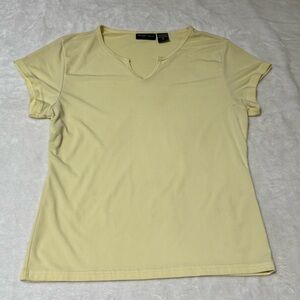 NY & Co Size Medium SoFt Pastel Yellow Top.  Polyester & spandex.